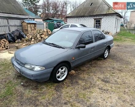 Серый Форд Мондео, объемом двигателя 1.8 л и пробегом 438 тыс. км за 900 $, фото 1 на Automoto.ua