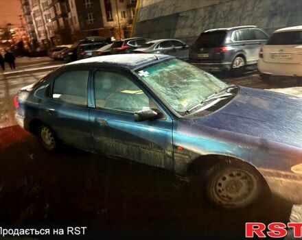 Синий Форд Мондео, объемом двигателя 1.6 л и пробегом 215 тыс. км за 1250 $, фото 4 на Automoto.ua