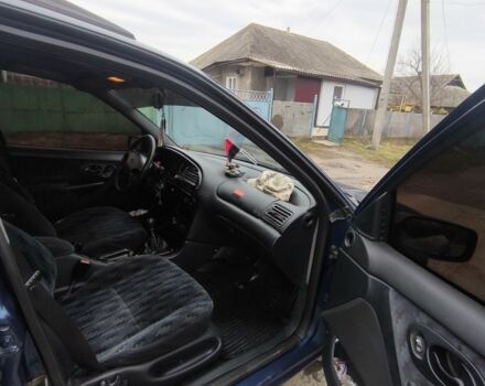 Синий Форд Мондео, объемом двигателя 1.8 л и пробегом 77 тыс. км за 1200 $, фото 7 на Automoto.ua