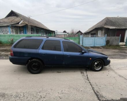 Синий Форд Мондео, объемом двигателя 1.8 л и пробегом 77 тыс. км за 1200 $, фото 5 на Automoto.ua