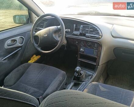 Синий Форд Мондео, объемом двигателя 1.8 л и пробегом 300 тыс. км за 999 $, фото 7 на Automoto.ua