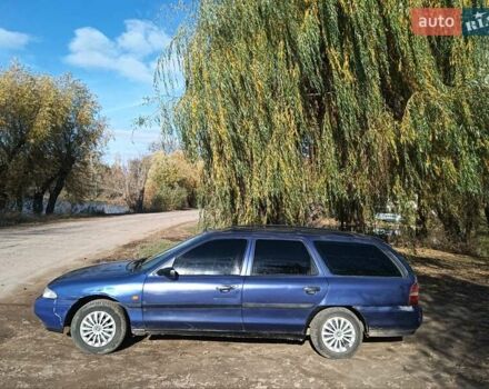 Синий Форд Мондео, объемом двигателя 1.8 л и пробегом 300 тыс. км за 999 $, фото 8 на Automoto.ua