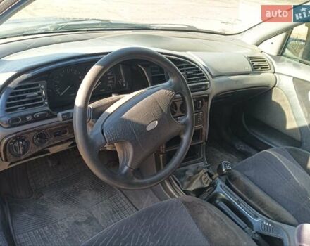 Синий Форд Мондео, объемом двигателя 1.8 л и пробегом 300 тыс. км за 999 $, фото 4 на Automoto.ua