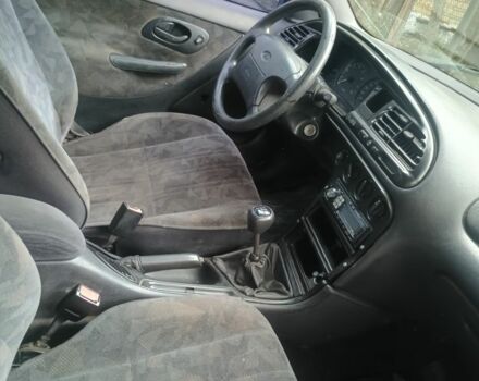 Синий Форд Мондео, объемом двигателя 1.8 л и пробегом 333 тыс. км за 1300 $, фото 6 на Automoto.ua