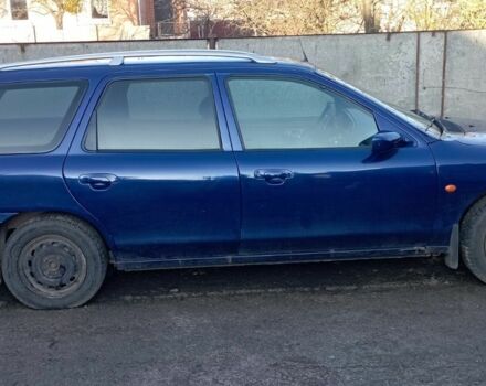 Синий Форд Мондео, объемом двигателя 1.8 л и пробегом 500 тыс. км за 900 $, фото 1 на Automoto.ua