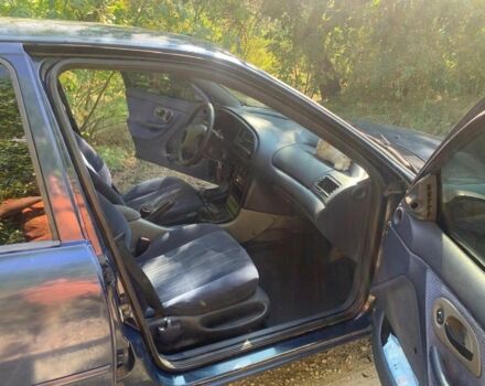 Синий Форд Мондео, объемом двигателя 1.8 л и пробегом 450 тыс. км за 1800 $, фото 5 на Automoto.ua