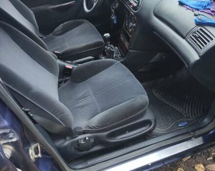 Синий Форд Мондео, объемом двигателя 2 л и пробегом 347 тыс. км за 2300 $, фото 19 на Automoto.ua