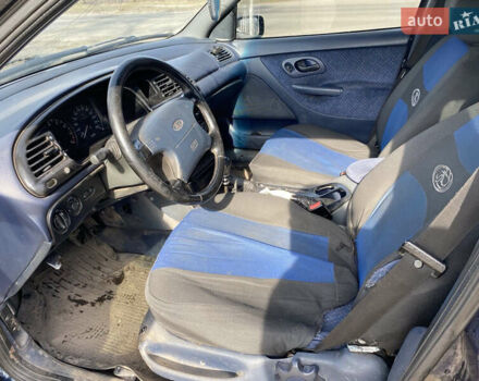 Синій Форд Мондео, об'ємом двигуна 1.8 л та пробігом 230 тис. км за 1200 $, фото 4 на Automoto.ua