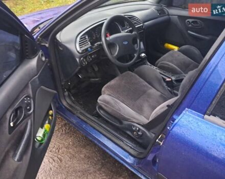 Синий Форд Мондео, объемом двигателя 1.8 л и пробегом 405 тыс. км за 1650 $, фото 1 на Automoto.ua