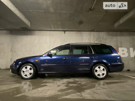 Синий Форд Мондео, объемом двигателя 2 л и пробегом 242 тыс. км за 4600 $, фото 1 на Automoto.ua