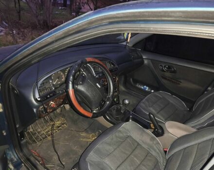 Зеленый Форд Мондео, объемом двигателя 2 л и пробегом 365 тыс. км за 380 $, фото 7 на Automoto.ua