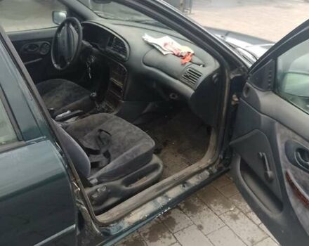 Зеленый Форд Мондео, объемом двигателя 1.6 л и пробегом 300 тыс. км за 1000 $, фото 2 на Automoto.ua