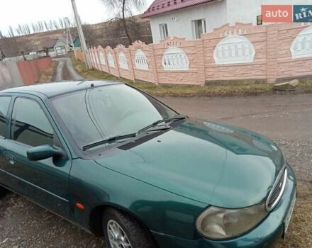 Зеленый Форд Мондео, объемом двигателя 1.8 л и пробегом 300 тыс. км за 2250 $, фото 1 на Automoto.ua