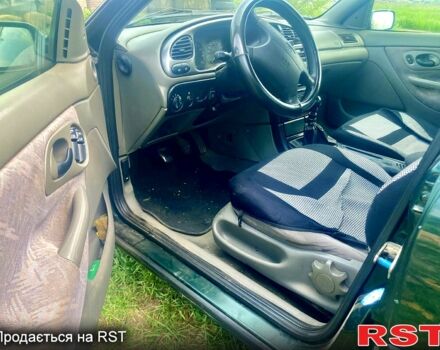 Зеленый Форд Мондео, объемом двигателя 1.8 л и пробегом 430 тыс. км за 3000 $, фото 2 на Automoto.ua