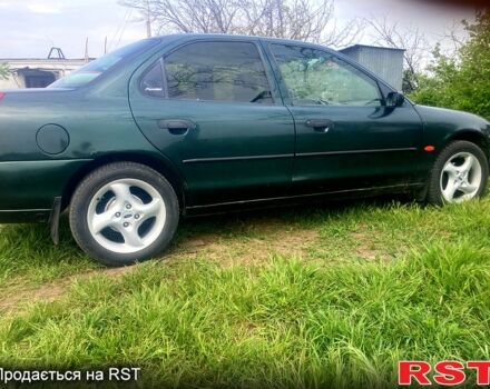 Зеленый Форд Мондео, объемом двигателя 1.8 л и пробегом 430 тыс. км за 3000 $, фото 7 на Automoto.ua