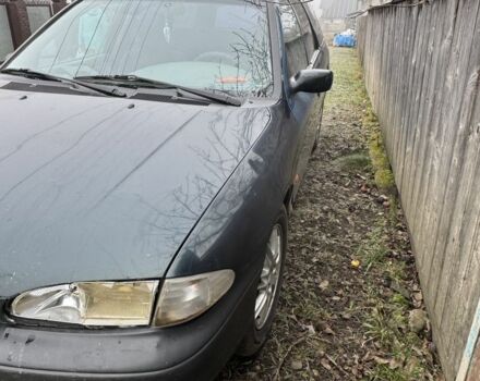 Зеленый Форд Мондео, объемом двигателя 2 л и пробегом 335 тыс. км за 900 $, фото 1 на Automoto.ua