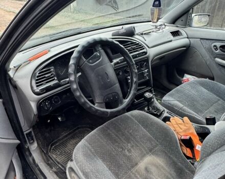 Зеленый Форд Мондео, объемом двигателя 2 л и пробегом 335 тыс. км за 900 $, фото 4 на Automoto.ua