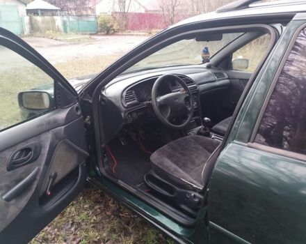 Зеленый Форд Мондео, объемом двигателя 1.8 л и пробегом 350 тыс. км за 985 $, фото 10 на Automoto.ua