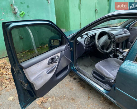 Зеленый Форд Мондео, объемом двигателя 1.8 л и пробегом 294 тыс. км за 2200 $, фото 12 на Automoto.ua