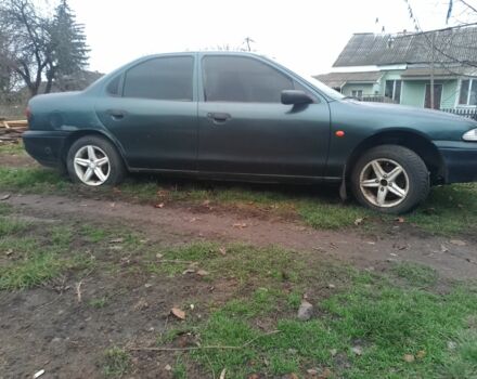 Зеленый Форд Мондео, объемом двигателя 1.6 л и пробегом 400 тыс. км за 643 $, фото 1 на Automoto.ua