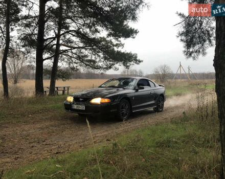 Черный Форд Мустанг, объемом двигателя 3.8 л и пробегом 200 тыс. км за 3800 $, фото 1 на Automoto.ua