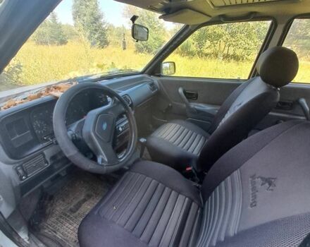 Білий Форд Оріон, об'ємом двигуна 1.4 л та пробігом 250 тис. км за 700 $, фото 2 на Automoto.ua