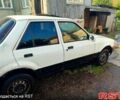 Белый Форд Орион, объемом двигателя 1.4 л и пробегом 100 тыс. км за 900 $, фото 1 на Automoto.ua