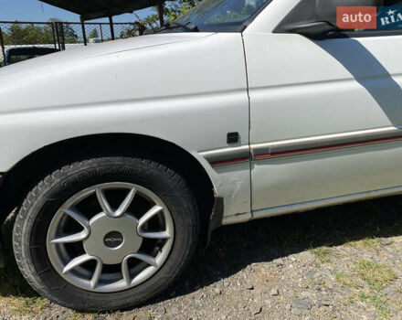 Белый Форд Орион, объемом двигателя 1.6 л и пробегом 307 тыс. км за 850 $, фото 2 на Automoto.ua