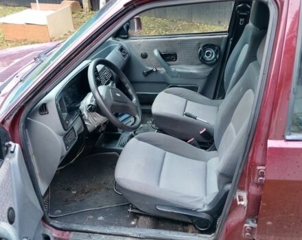 Красный Форд Орион, объемом двигателя 2 л и пробегом 300 тыс. км за 600 $, фото 2 на Automoto.ua