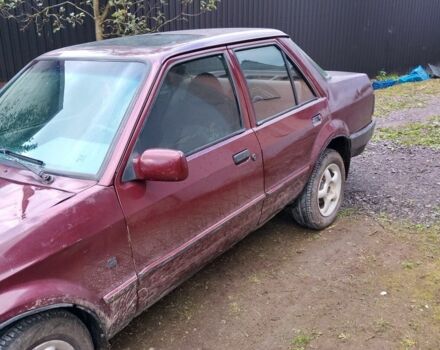 Красный Форд Орион, объемом двигателя 2 л и пробегом 300 тыс. км за 600 $, фото 1 на Automoto.ua