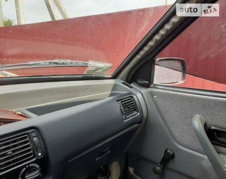 Красный Форд Орион, объемом двигателя 1.4 л и пробегом 240 тыс. км за 799 $, фото 8 на Automoto.ua