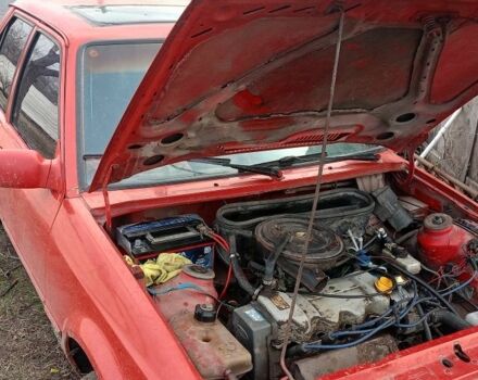 Красный Форд Орион, объемом двигателя 1.4 л и пробегом 111 тыс. км за 600 $, фото 2 на Automoto.ua