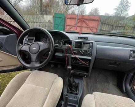 Красный Форд Орион, объемом двигателя 1.6 л и пробегом 97 тыс. км за 714 $, фото 6 на Automoto.ua