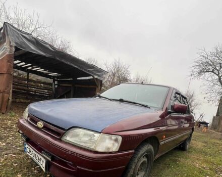 Красный Форд Орион, объемом двигателя 1.6 л и пробегом 97 тыс. км за 714 $, фото 3 на Automoto.ua