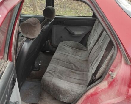 Красный Форд Орион, объемом двигателя 1.6 л и пробегом 300 тыс. км за 350 $, фото 5 на Automoto.ua