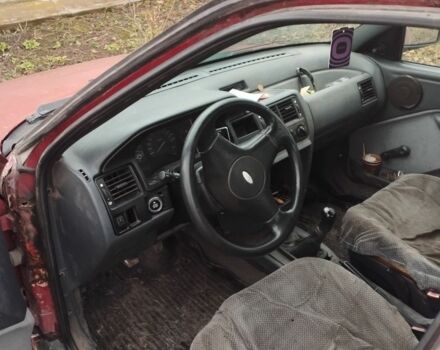 Красный Форд Орион, объемом двигателя 1.6 л и пробегом 300 тыс. км за 350 $, фото 6 на Automoto.ua