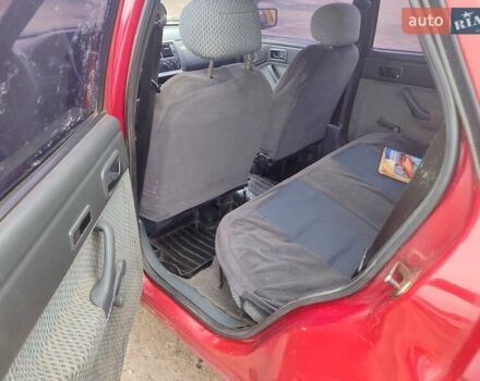 Червоний Форд Оріон, об'ємом двигуна 1.6 л та пробігом 333 тис. км за 614 $, фото 2 на Automoto.ua