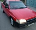 Красный Форд Орион, объемом двигателя 1.4 л и пробегом 178 тыс. км за 860 $, фото 1 на Automoto.ua