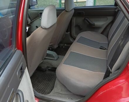 Красный Форд Орион, объемом двигателя 1.6 л и пробегом 800 тыс. км за 2000 $, фото 5 на Automoto.ua