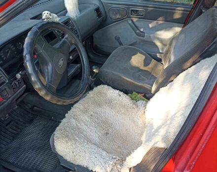 Красный Форд Орион, объемом двигателя 1.4 л и пробегом 341 тыс. км за 1000 $, фото 7 на Automoto.ua