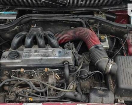 Червоний Форд Оріон, об'ємом двигуна 1.8 л та пробігом 210 тис. км за 1200 $, фото 11 на Automoto.ua