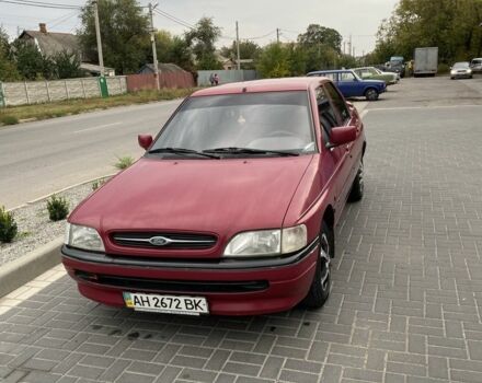 Червоний Форд Оріон, об'ємом двигуна 1.4 л та пробігом 72 тис. км за 815 $, фото 1 на Automoto.ua