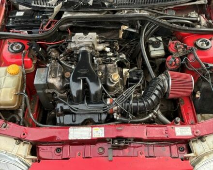 Красный Форд Орион, объемом двигателя 0.16 л и пробегом 300 тыс. км за 1100 $, фото 7 на Automoto.ua