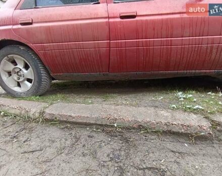 Красный Форд Орион, объемом двигателя 2 л и пробегом 186 тыс. км за 599 $, фото 2 на Automoto.ua