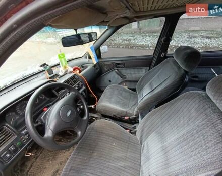 Красный Форд Орион, объемом двигателя 2 л и пробегом 186 тыс. км за 599 $, фото 3 на Automoto.ua