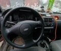 Красный Форд Орион, объемом двигателя 2 л и пробегом 186 тыс. км за 599 $, фото 5 на Automoto.ua