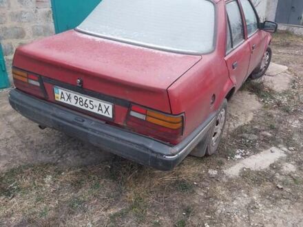 Красный Форд Орион, объемом двигателя 1.4 л и пробегом 125 тыс. км за 500 $, фото 1 на Automoto.ua