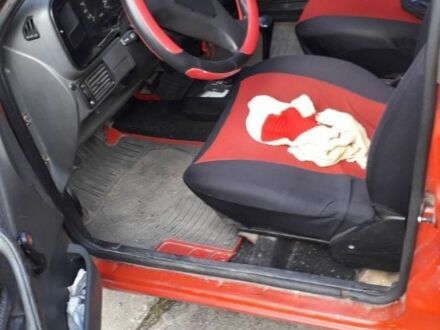 Красный Форд Орион, объемом двигателя 1.8 л и пробегом 480 тыс. км за 550 $, фото 1 на Automoto.ua