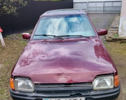 Красный Форд Орион, объемом двигателя 2 л и пробегом 300 тыс. км за 600 $, фото 1 на Automoto.ua