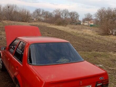Красный Форд Орион, объемом двигателя 1.4 л и пробегом 111 тыс. км за 600 $, фото 1 на Automoto.ua